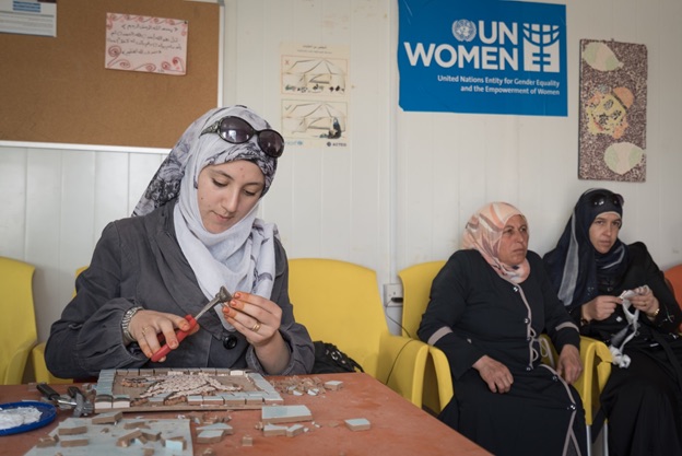 Alaa in a mosaic workshop in UN Women’s women center (Oasis) in Zaatari Refugee Camp. Photo: UN Women/Christopher Herwig